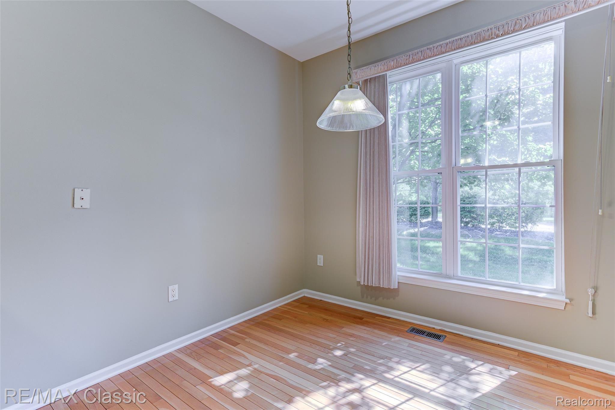 41620 Mitchell Road Novi, MI 48377 - Photo 21 of 40 Kitchen nook wood flooring