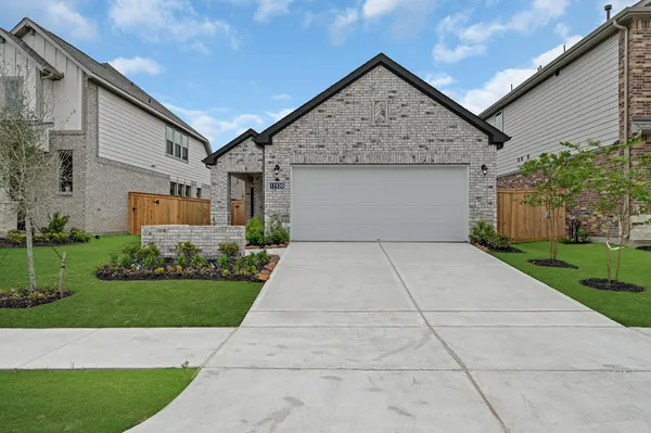 a view of garage yard and tree
