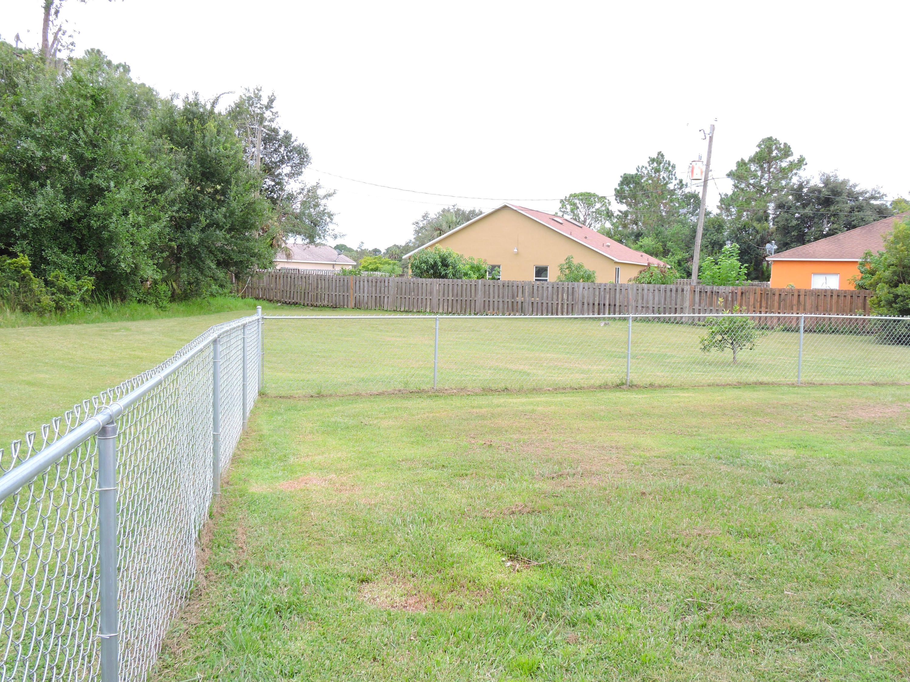 445 Avocado Road Northwest Palm Bay, FL 32907 - Photo 11 of 12 rear yard