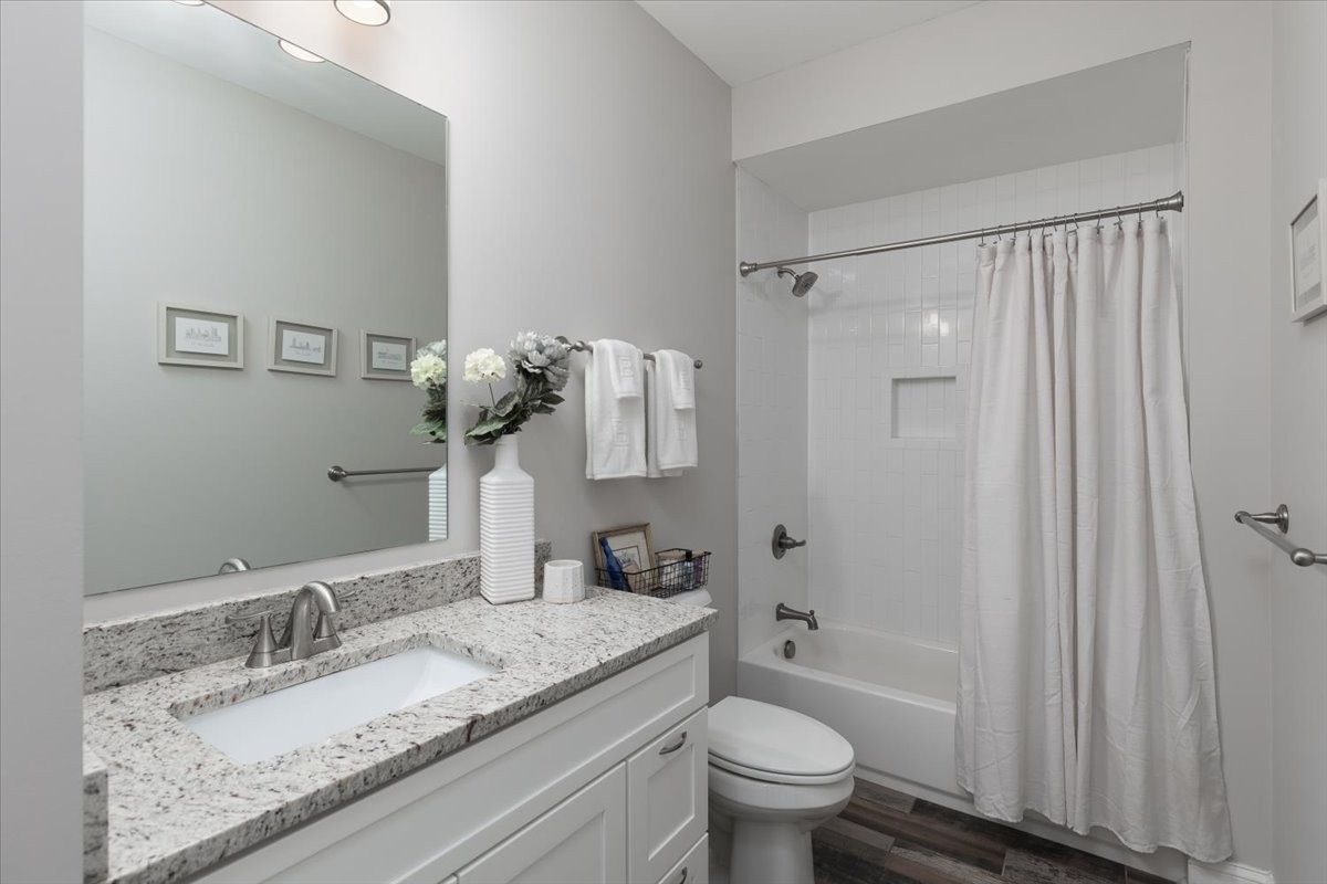 175 B Rural Avenue Nashville, TN 37209 - Photo 13 of 26 a bathroom with a granite countertop sink toilet and shower