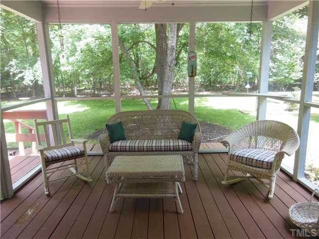 1115 Briardale Road Durham, NC 27712 - Photo 17 of 25 An incrediblly appealing backyard is just beyond the 24 X 12 deck and 12 X 12 screened porch with ceiling fan above. Can't you just picture munching a bagel and having morning coffee with the paper here? Or iced tea in the evening. So private too. Screened Porch