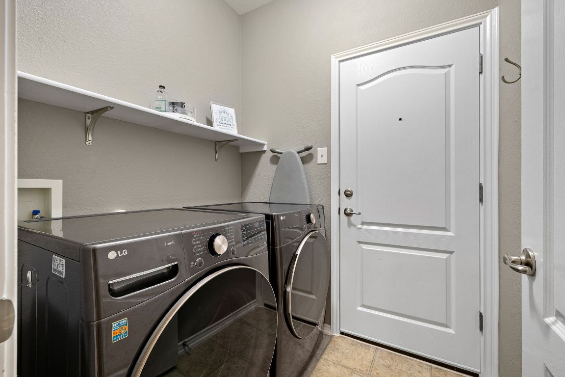 408 Tyree Road Cedar Park, TX 78613 - Photo 21 of 25 a utility room with dryer and washer