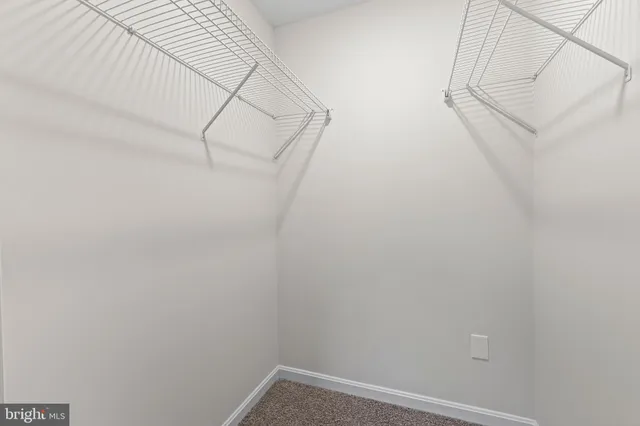 a view of small space with racks on the wall