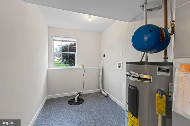 a view of a workspace with furniture