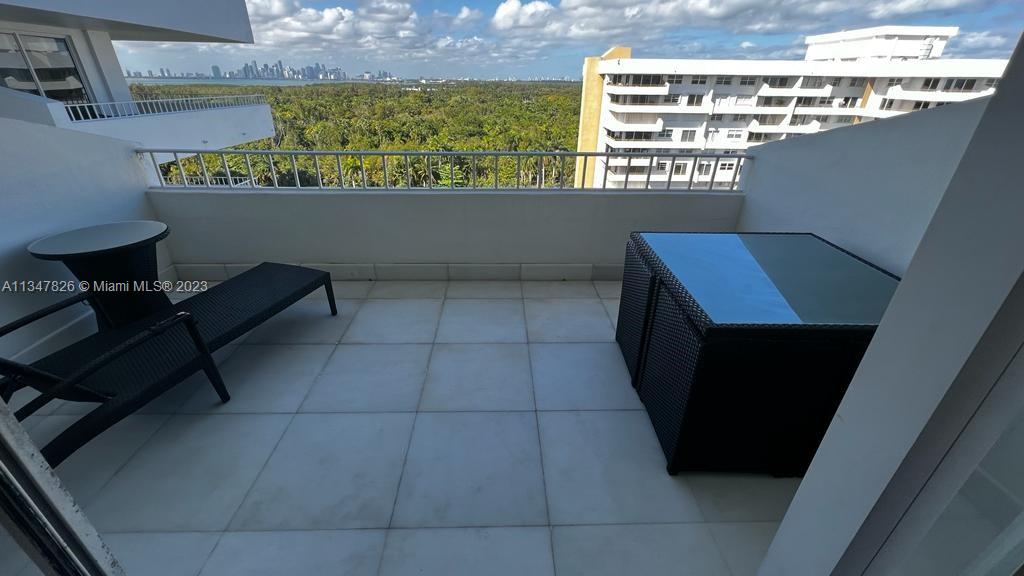 199 Ocean Ln Drive, Unit 1206 Key Biscayne, FL 33149 - Photo 3 of 12 a view of a chairs in a room