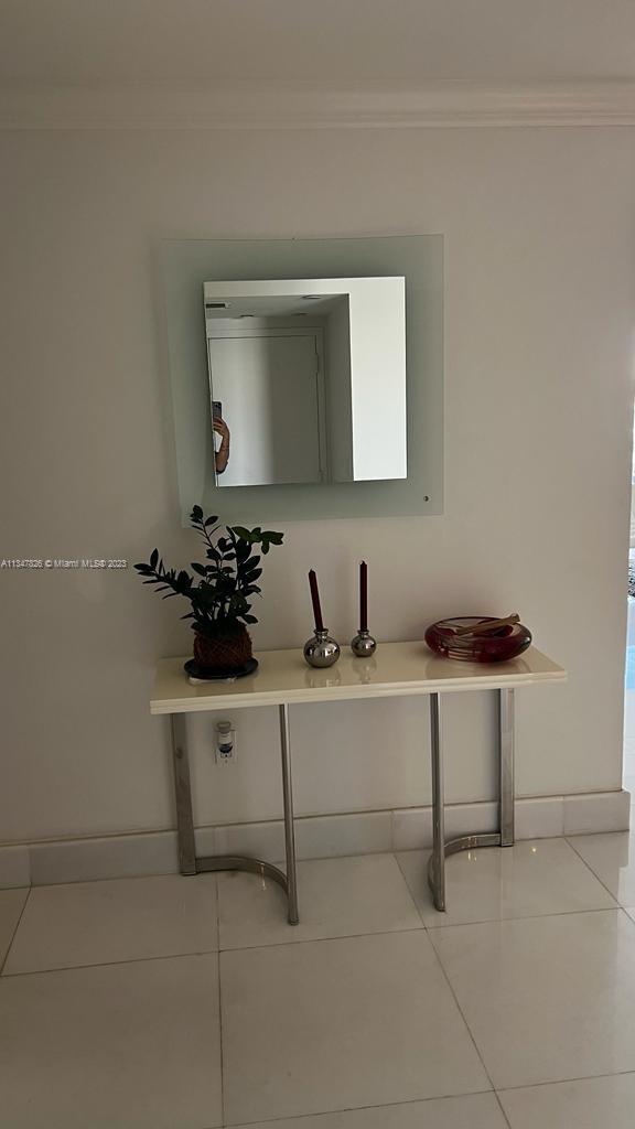 199 Ocean Ln Drive, Unit 1206 Key Biscayne, FL 33149 - Photo 7 of 12 a bathroom with a sink and a mirror