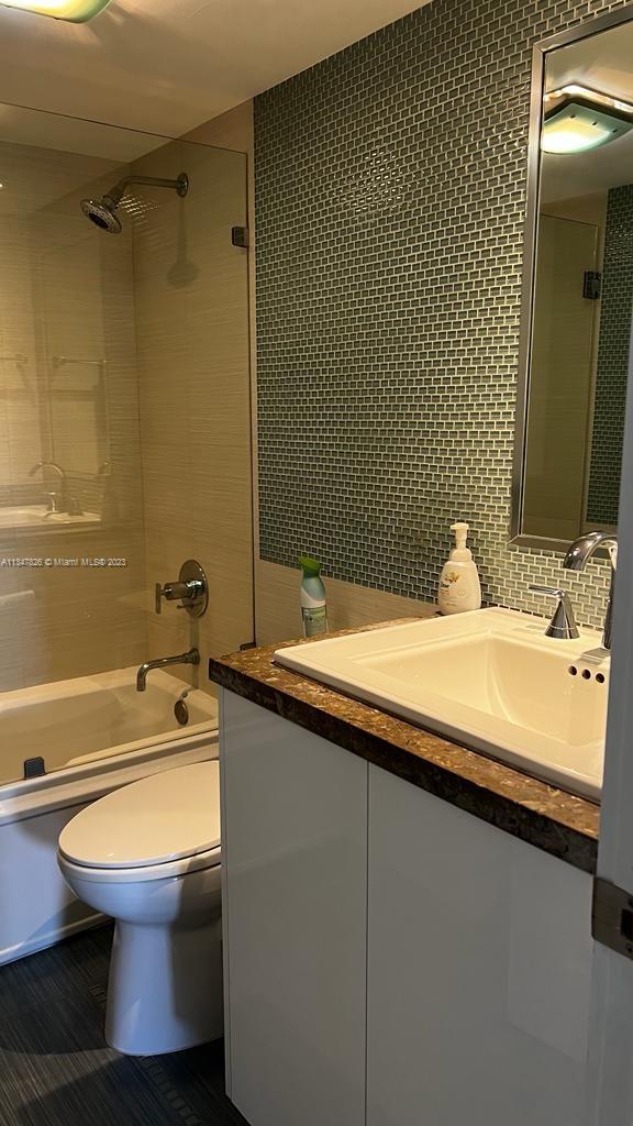 199 Ocean Ln Drive, Unit 1206 Key Biscayne, FL 33149 - Photo 8 of 12 a bathroom with a sink and a mirror