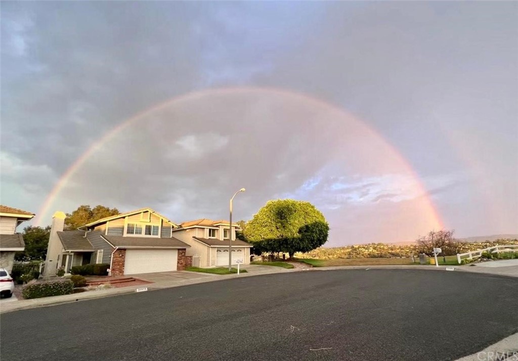 a view of a street with houses