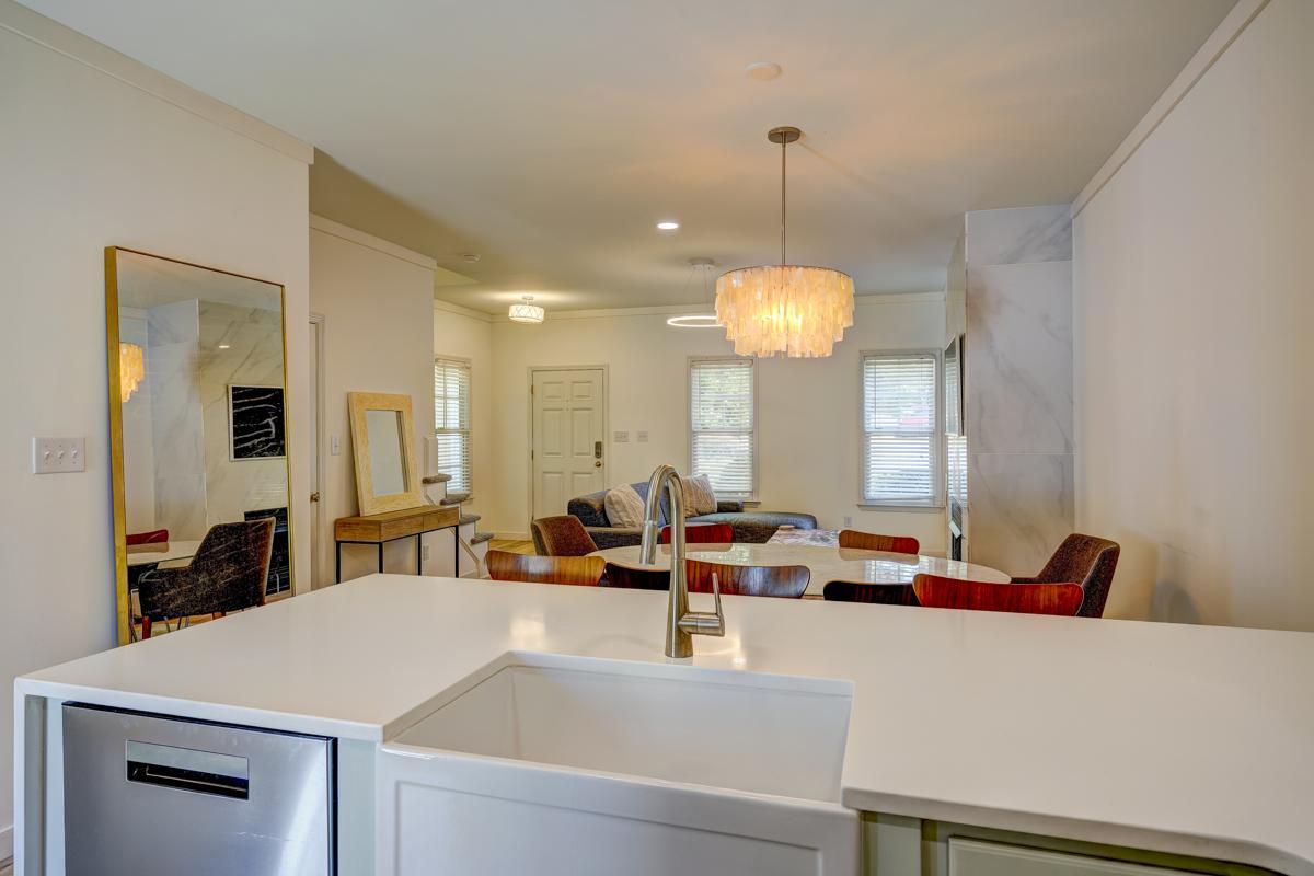 20017 Roark Hoey Loop Chapel Hill, NC 27517 - Photo 17 of 44 a large living room with a large window