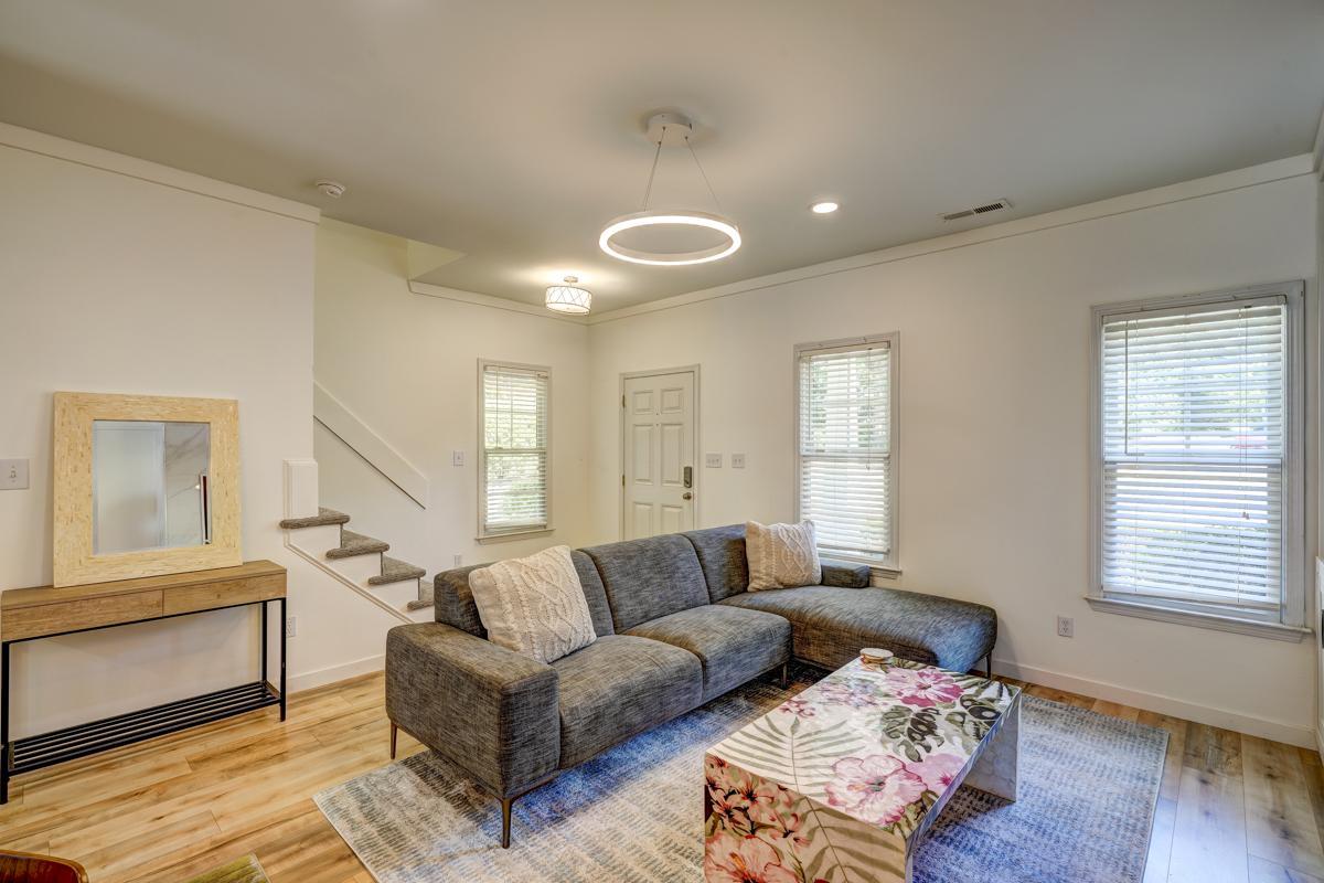 20017 Roark Hoey Loop Chapel Hill, NC 27517 - Photo 23 of 44 a living room with furniture and a window