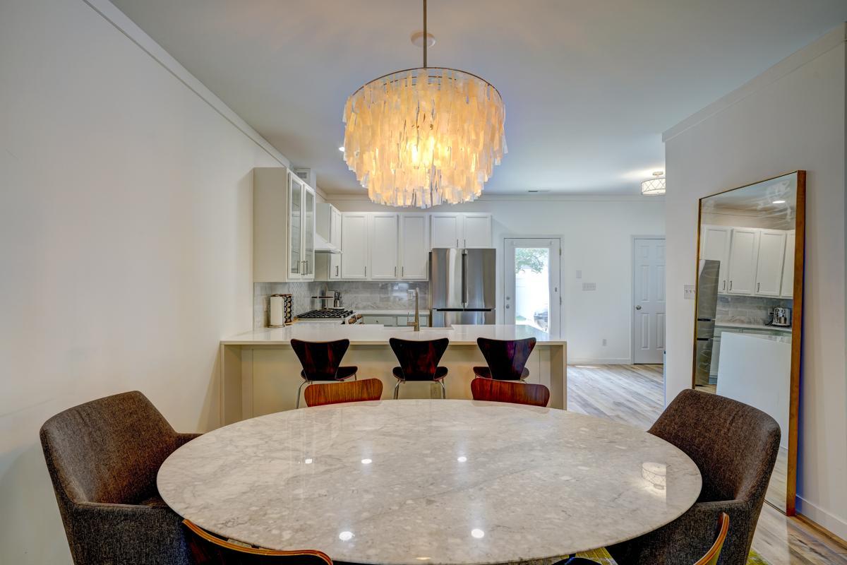 20017 Roark Hoey Loop Chapel Hill, NC 27517 - Photo 27 of 44 a view of a dining room with furniture
