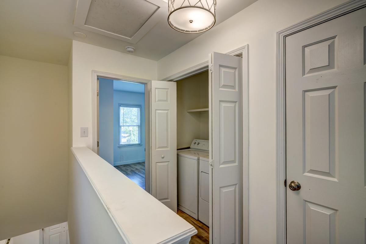 20017 Roark Hoey Loop Chapel Hill, NC 27517 - Photo 32 of 44 a view of a hallway with wooden floor