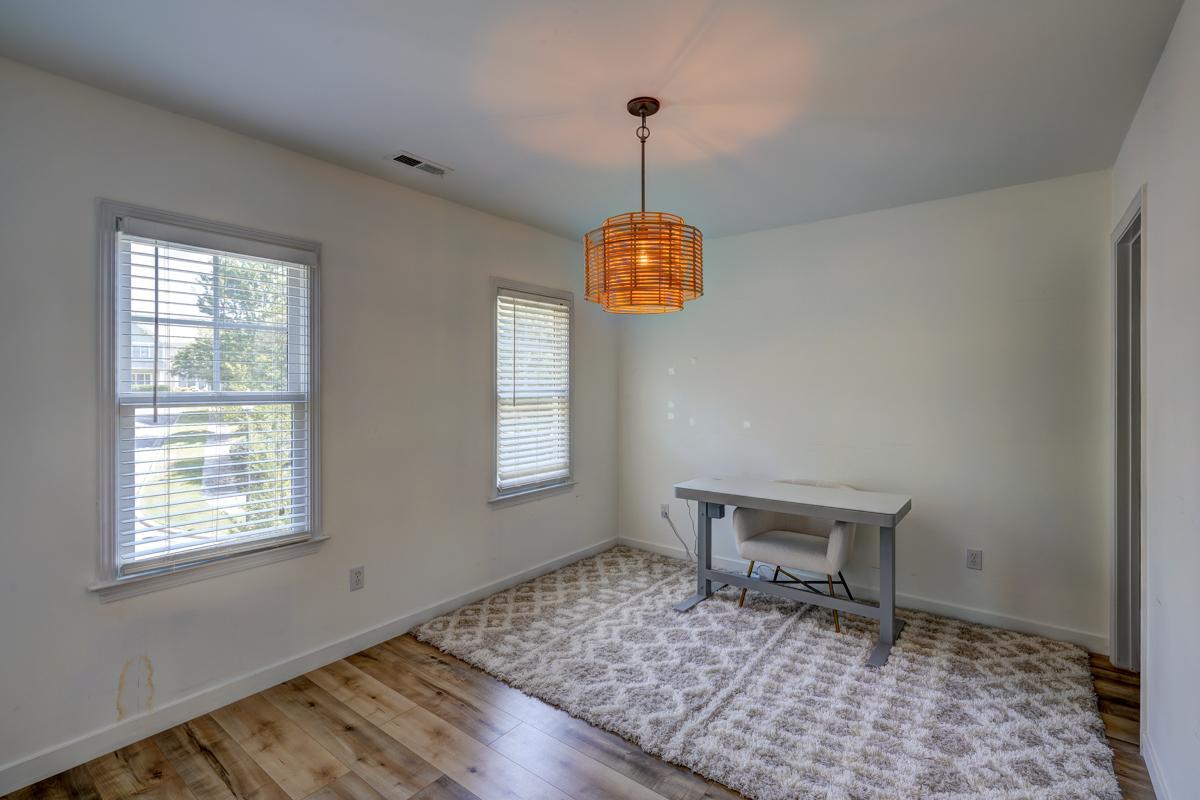 20017 Roark Hoey Loop Chapel Hill, NC 27517 - Photo 35 of 44 a front view of a house with windows