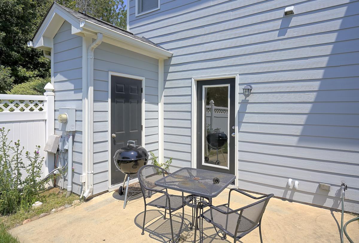 20017 Roark Hoey Loop Chapel Hill, NC 27517 - Photo 37 of 44 a view of a patio with table and chairs and potted plants