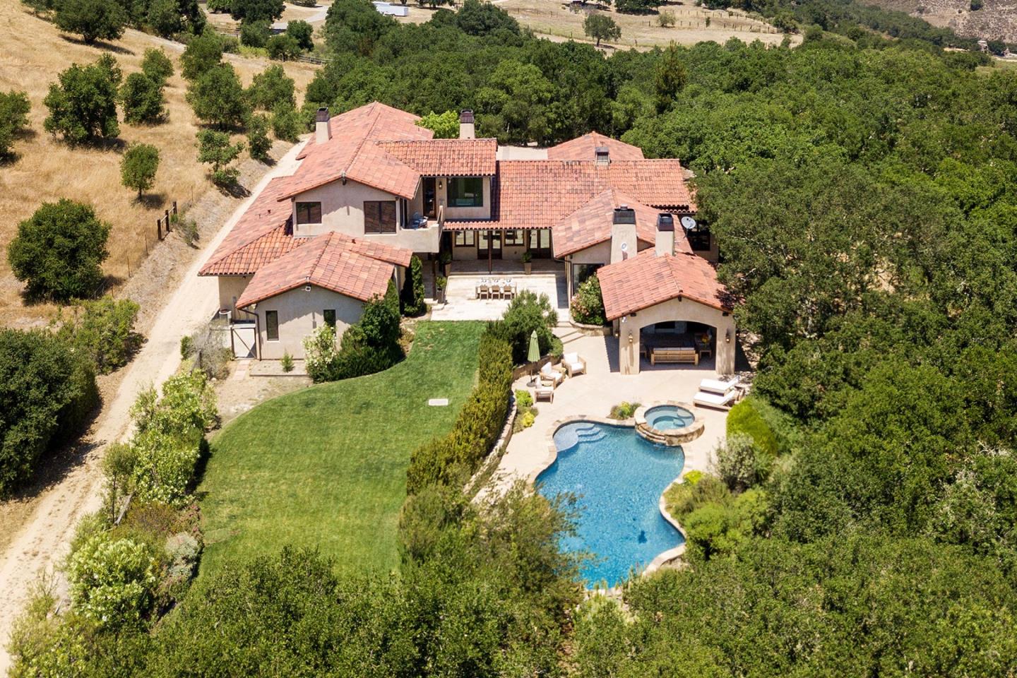 960 Laureles Grade Carmel Valley, CA 93924 - Photo 2 of 76 an aerial view of residential houses with outdoor space and parking