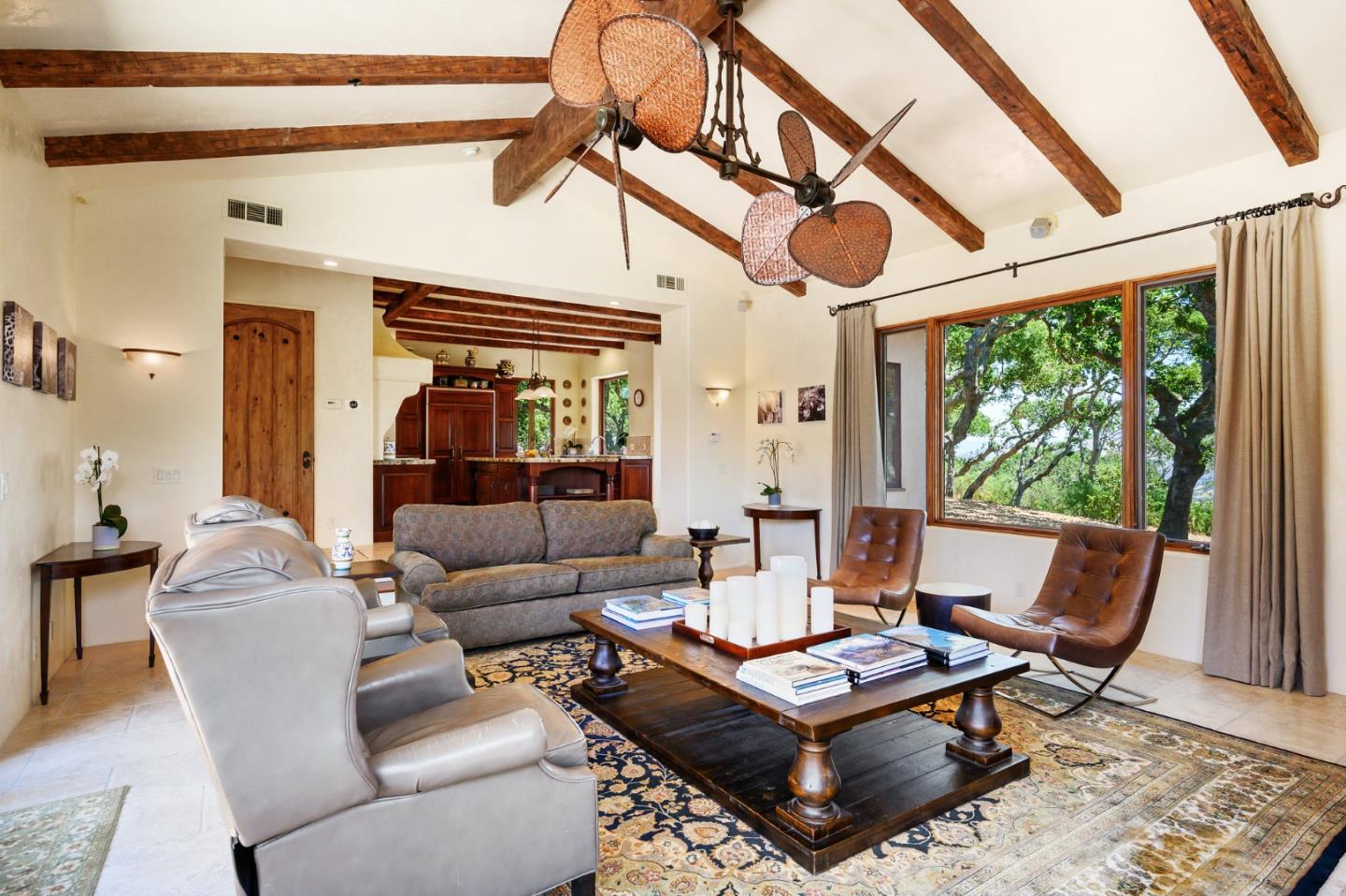 960 Laureles Grade Carmel Valley, CA 93924 - Photo 22 of 76 a living room with furniture and a large window