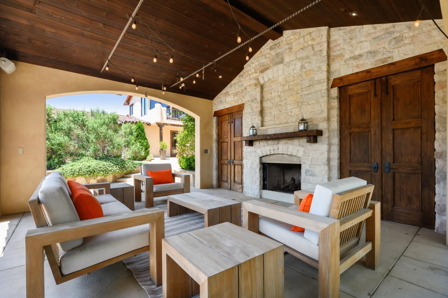 960 Laureles Grade Carmel Valley, CA 93924 - Photo 28 of 76 a outdoor space with patio furniture and a fireplace