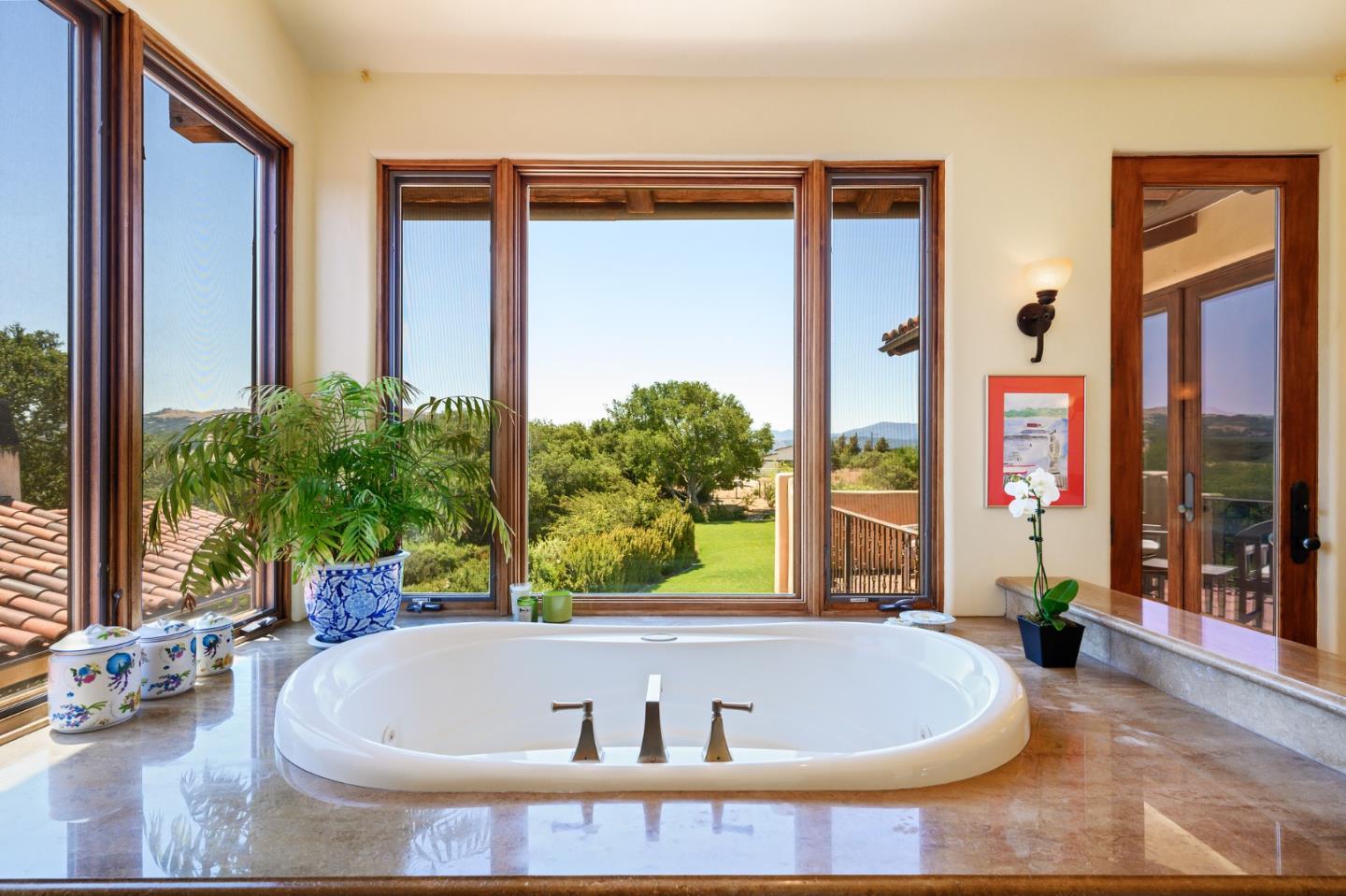 960 Laureles Grade Carmel Valley, CA 93924 - Photo 46 of 76 a white bath tub sitting in front of a window