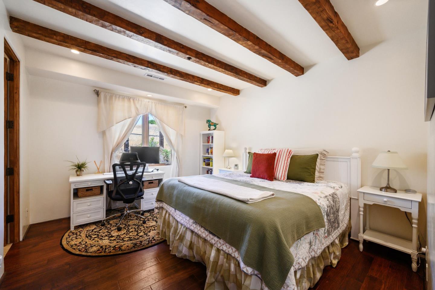 960 Laureles Grade Carmel Valley, CA 93924 - Photo 58 of 76 a bedroom with a bed and a table