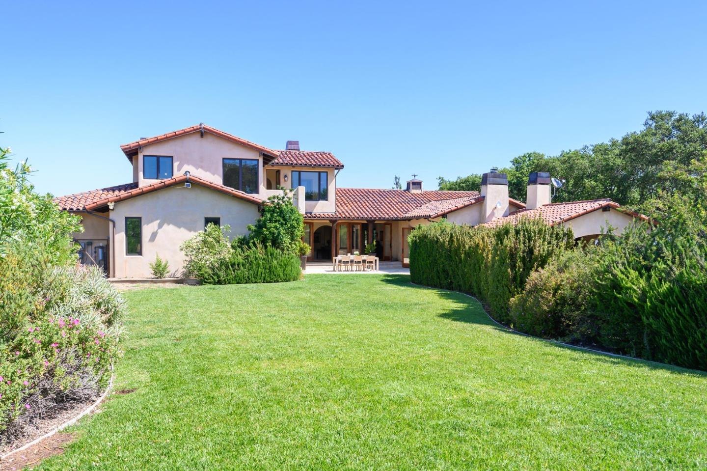 960 Laureles Grade Carmel Valley, CA 93924 - Photo 61 of 76 a front view of a house with a yard