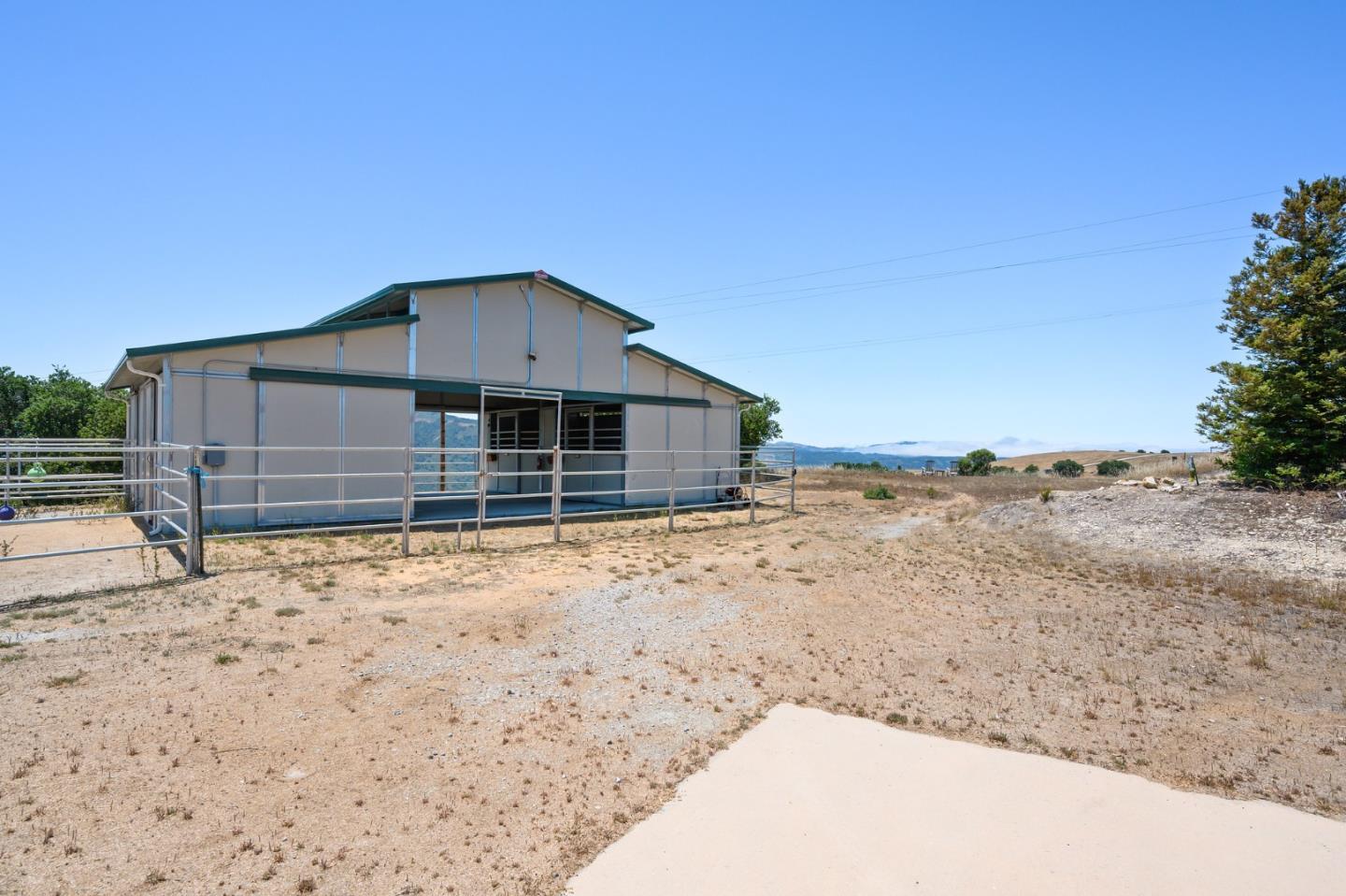 960 Laureles Grade Carmel Valley, CA 93924 - Photo 70 of 76 a house with trees in the background