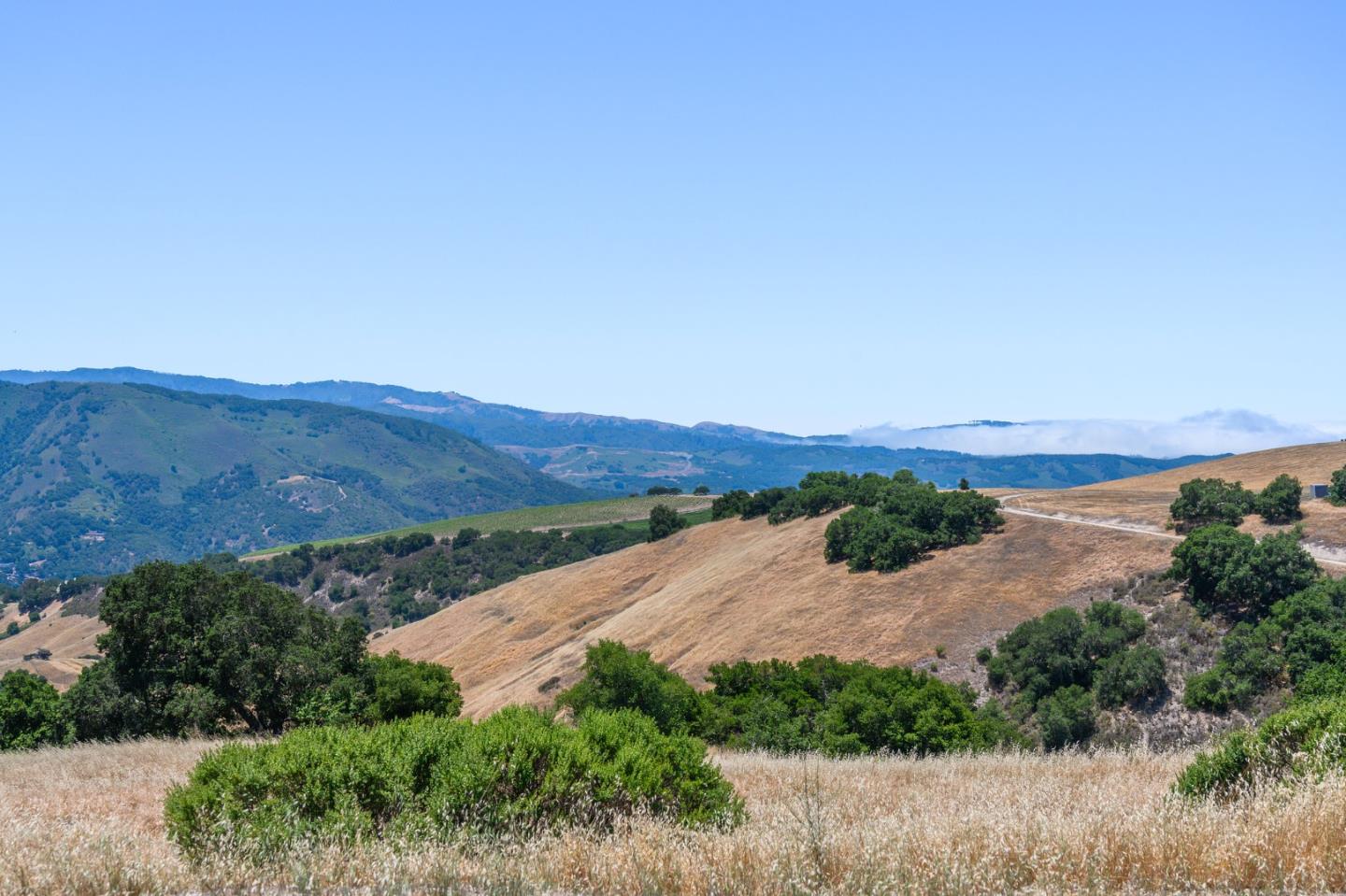 960 Laureles Grade Carmel Valley, CA 93924 - Photo 73 of 76 an aerial view of residential house and mountain view