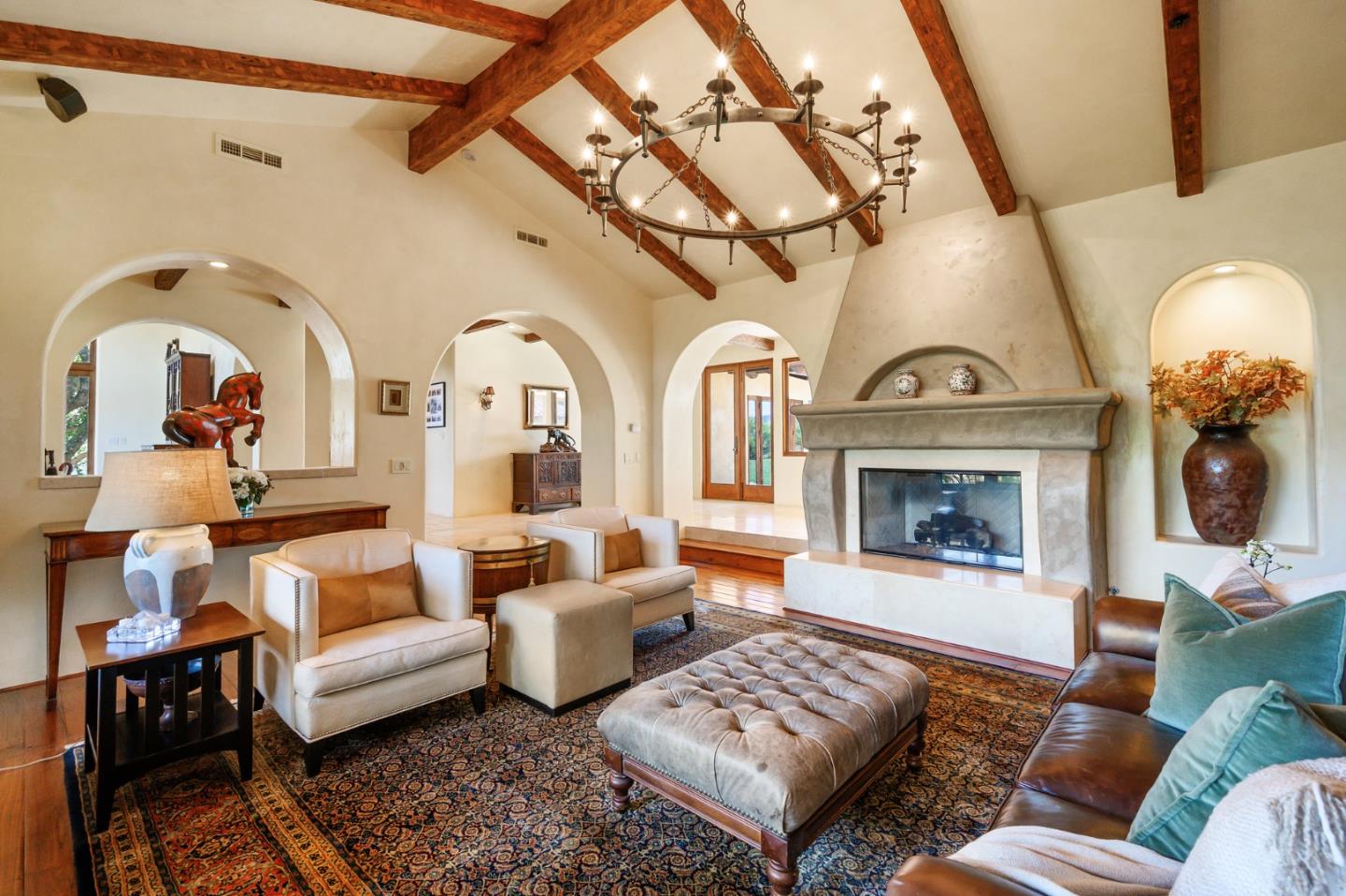 960 Laureles Grade Carmel Valley, CA 93924 - Photo 9 of 76 a living room with furniture and a fireplace