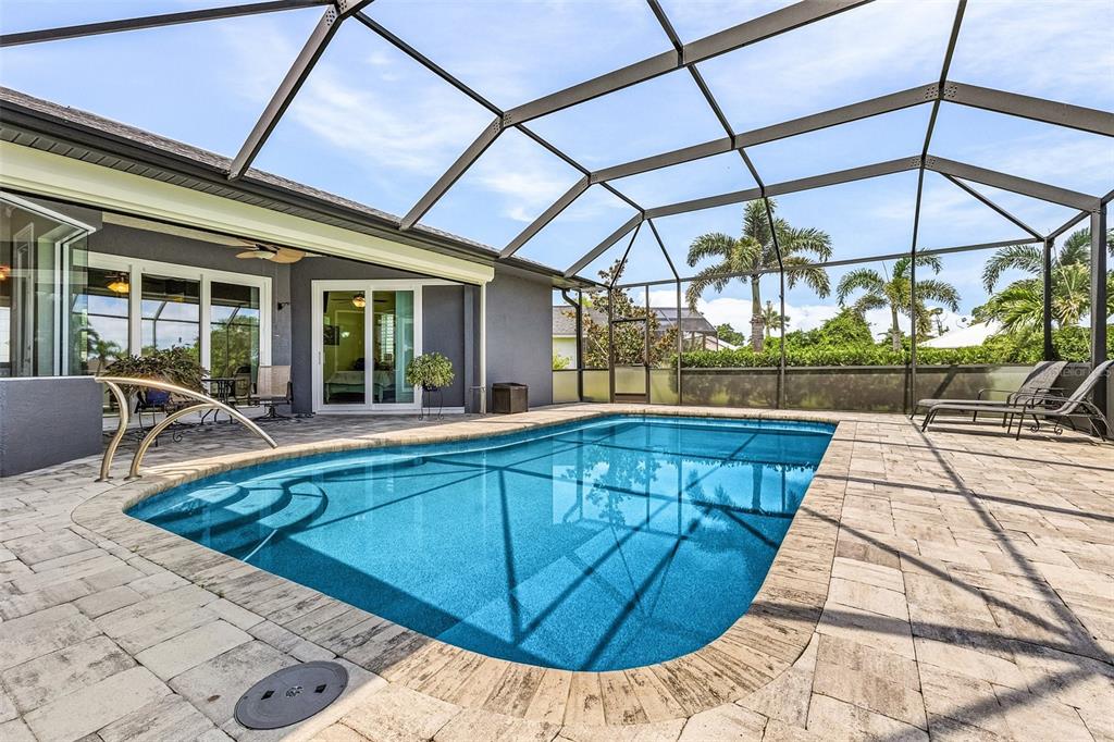 7130 Scarlet Sage Court Punta Gorda, FL 33955 - Photo 22 of 26 a view of a backyard with sitting area