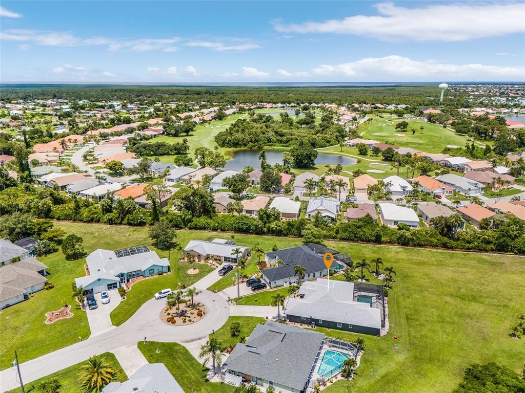 7130 Scarlet Sage Court Punta Gorda, FL 33955 - Photo 26 of 26 an aerial view of residential houses with outdoor space