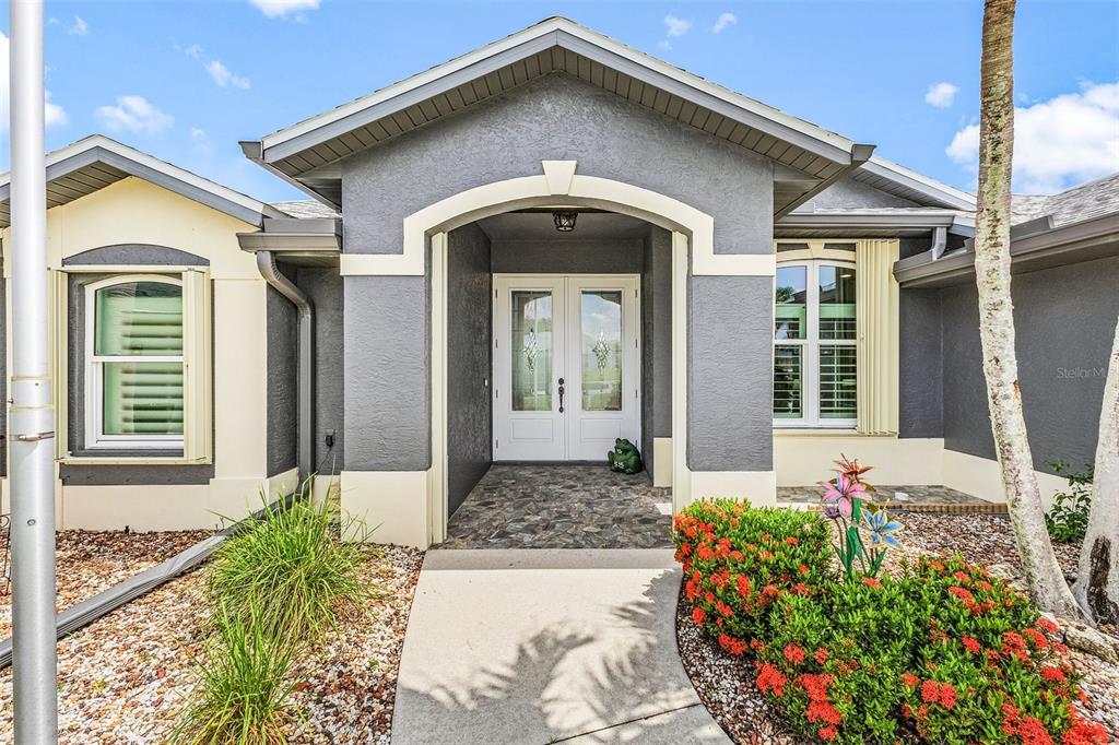 7130 Scarlet Sage Court Punta Gorda, FL 33955 - Photo 4 of 26 a front view of a house