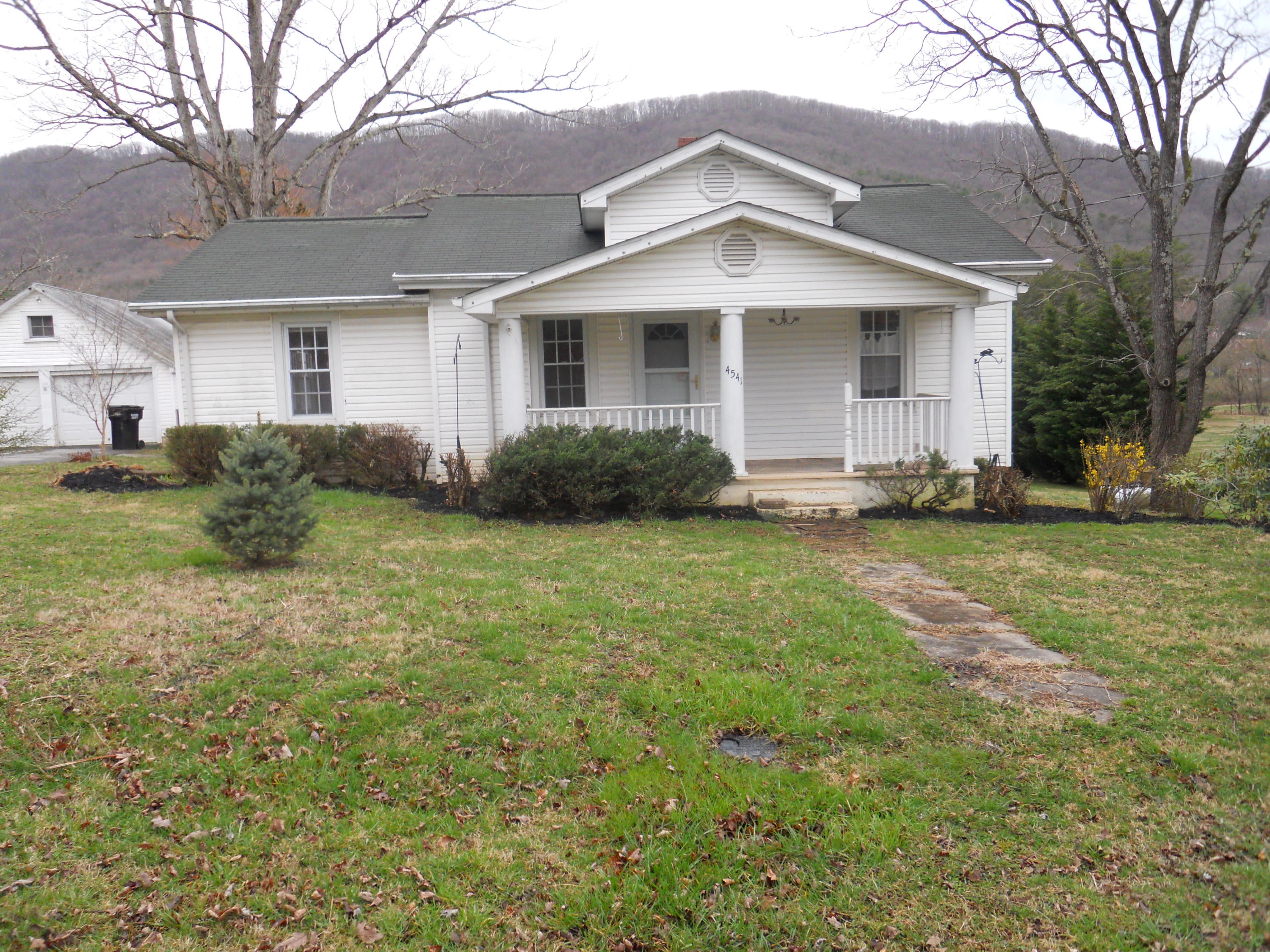 4541 Cowman Road Roanoke, VA 24014 - Photo 1 of 23 a front view of a house with a yard