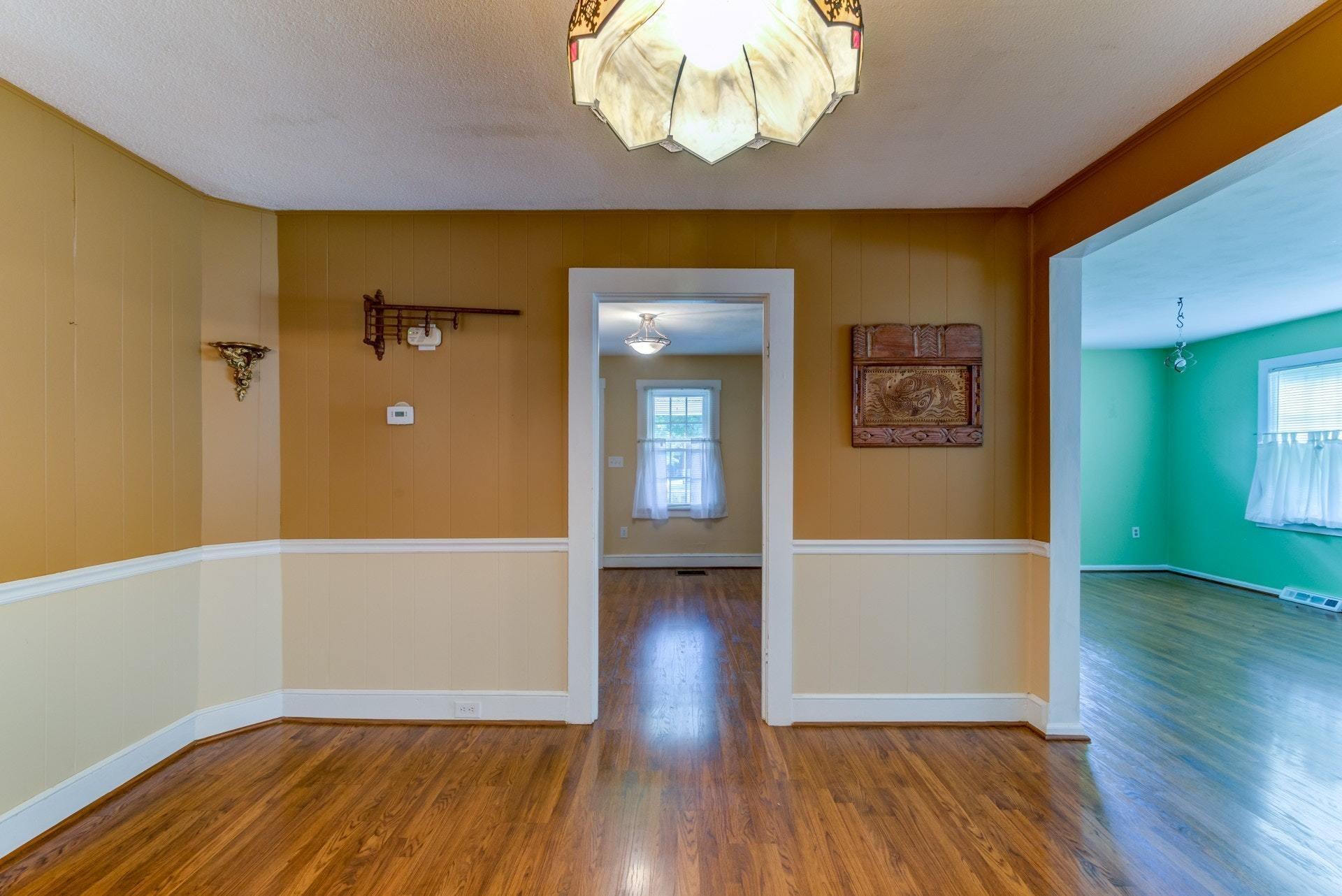 4541 Cowman Road Roanoke, VA 24014 - Photo 16 of 23 wooden floor in an empty room with a window