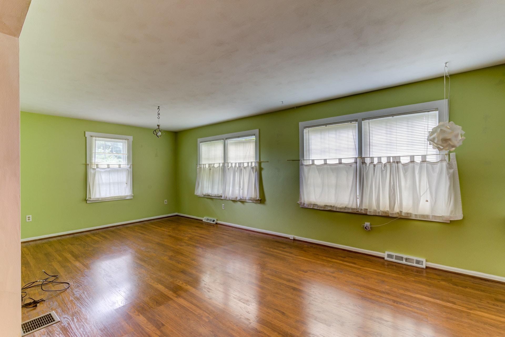 4541 Cowman Road Roanoke, VA 24014 - Photo 17 of 23 a view of empty room with wooden floor and fan
