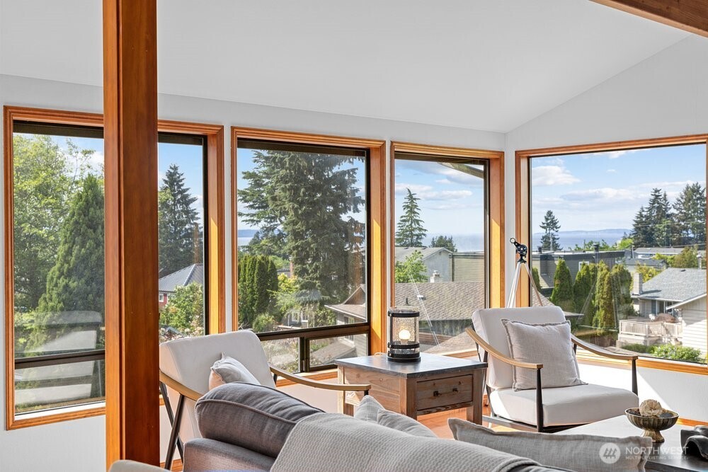 902 7th Avenue South Edmonds, WA 98020 - Photo 7 of 31 a living room with furniture and floor to ceiling windows