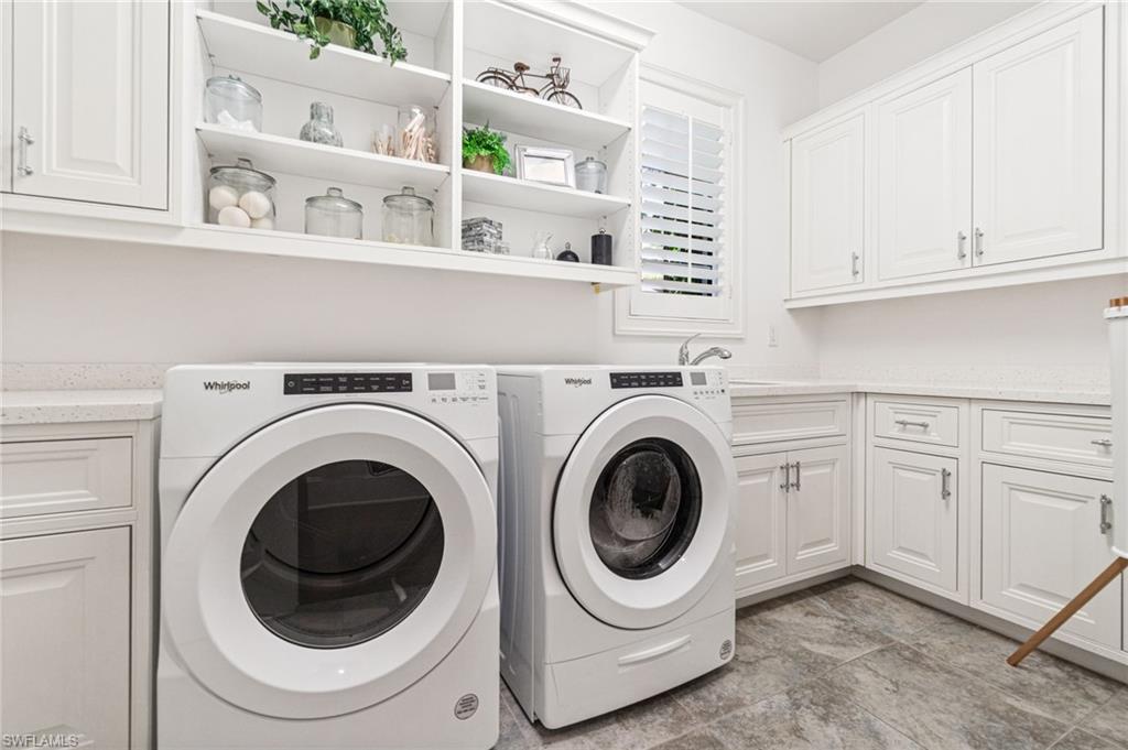16755 Lucarno Way Naples, FL 34110 - Photo 24 of 50 a utility room with dryer and washer