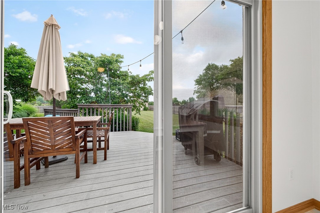 35748 Mills Road Avon, OH 44011 - Photo 31 of 44 Wooden deck featuring outdoor dining area