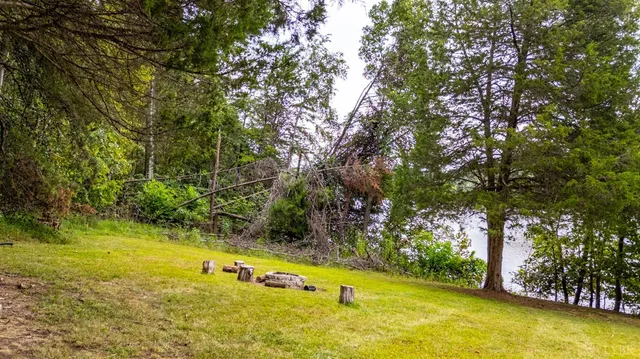a view of swimming pool with seating area