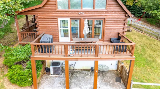 a picture of a room with a painting on the wall