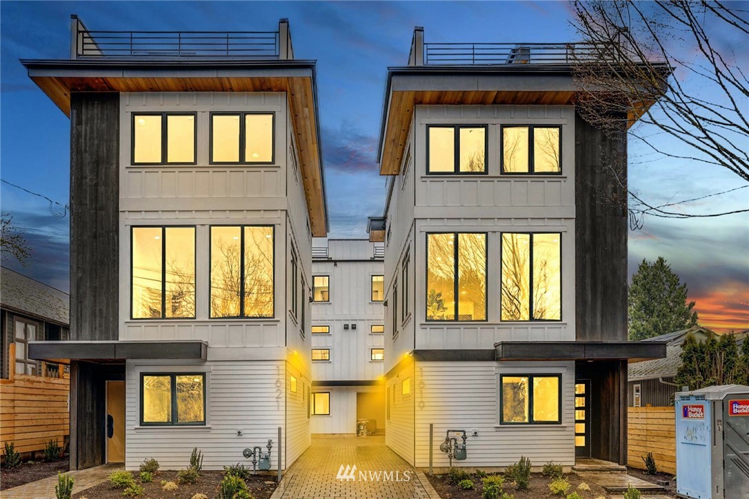1619 North 50th Street Seattle, WA 98103 - Photo 26 of 37 a front view of a multi story residential apartment building