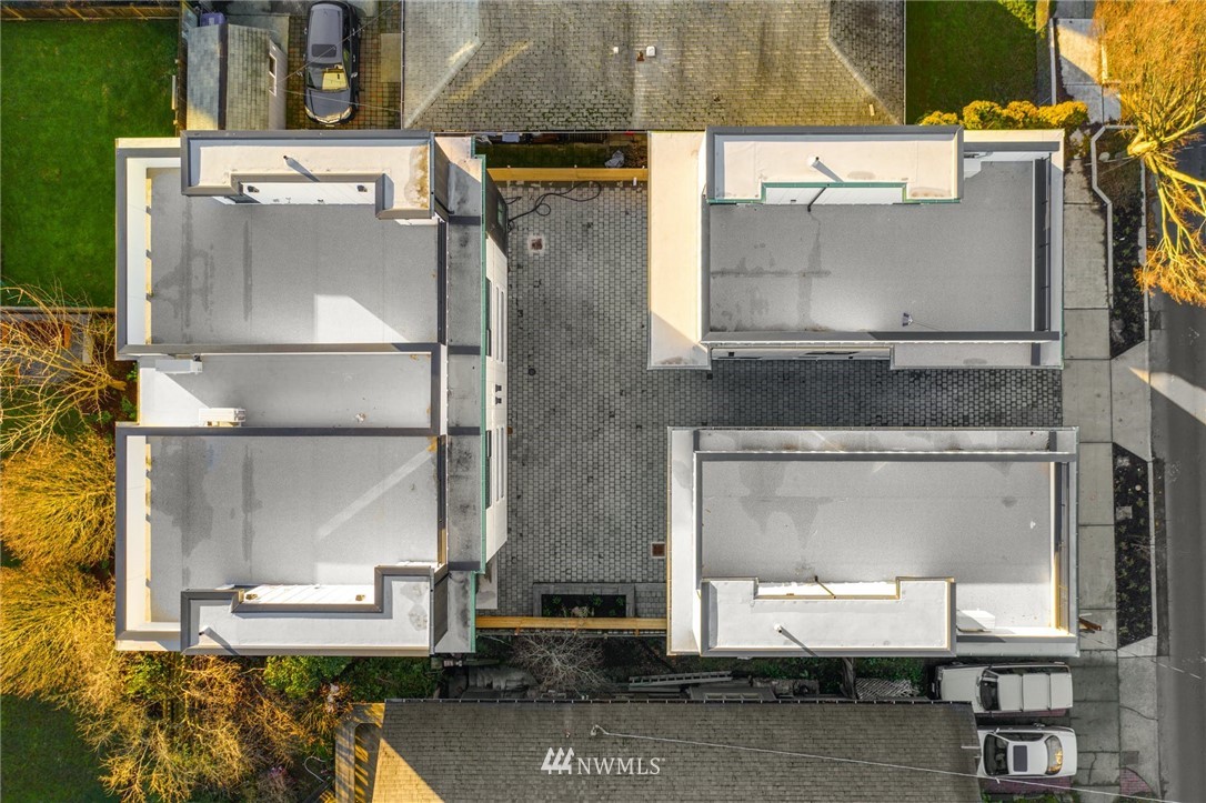 1619 North 50th Street Seattle, WA 98103 - Photo 32 of 37 an aerial view of a residential houses with yard