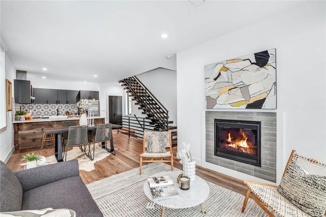1619 North 50th Street Seattle, WA 98103 - Photo 4 of 37 a living room with furniture and a fireplace