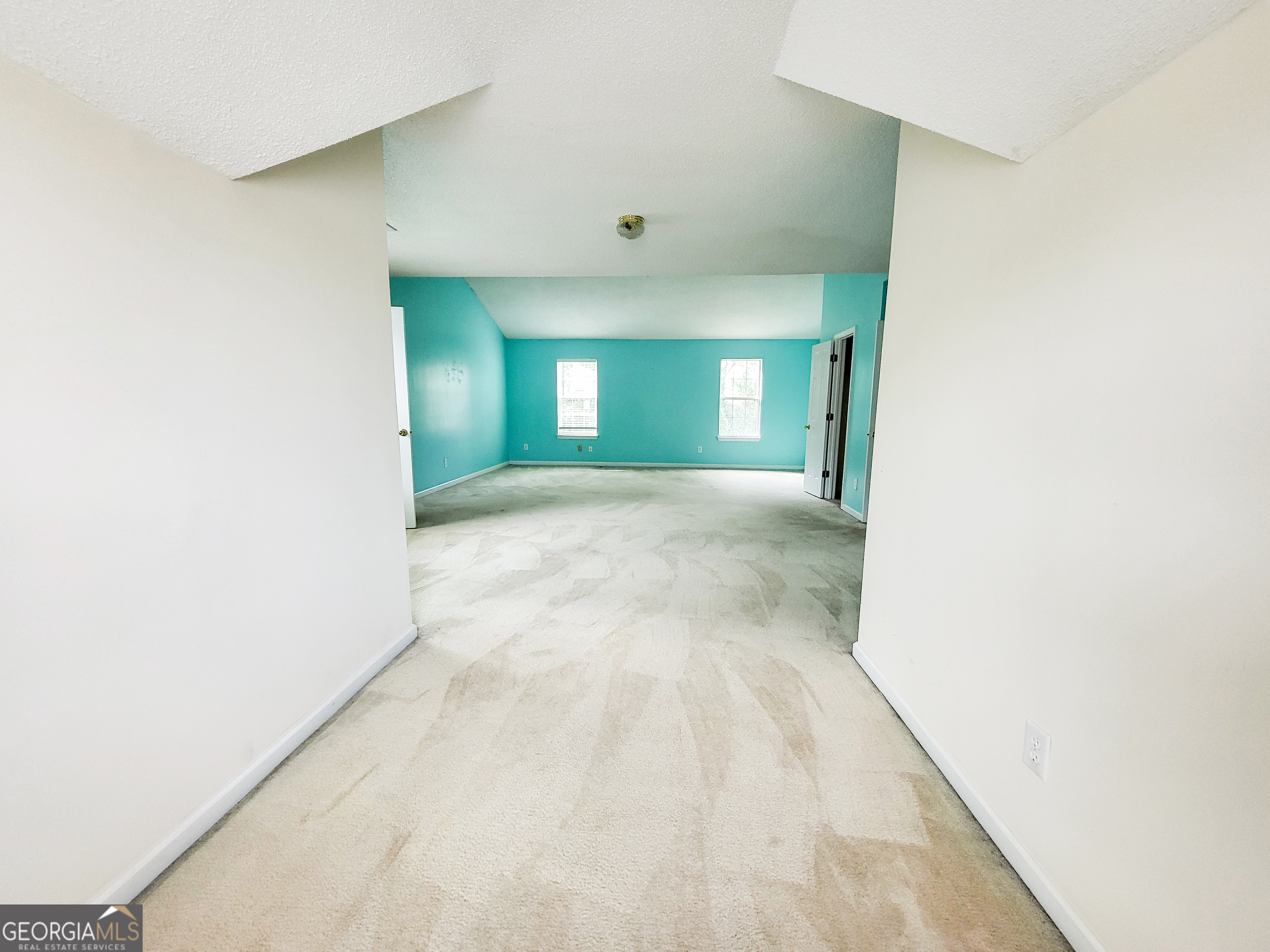 6232 Springwater Lane Lithonia, GA 30058 - Photo 23 of 32 a view of a hallway with a window