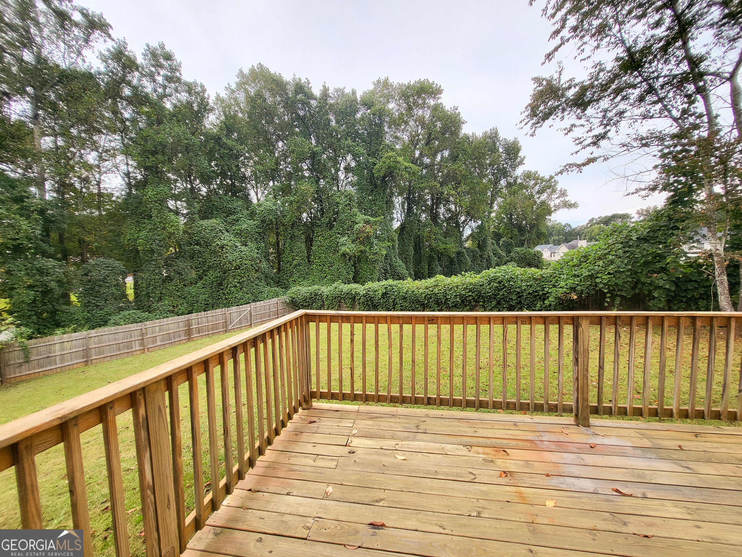 6232 Springwater Lane Lithonia, GA 30058 - Photo 26 of 32 a view of balcony with wooden floor