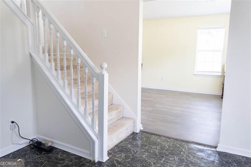 6232 Springwater Lane Lithonia, GA 30058 - Photo 3 of 32 a view of entryway with wooden floor