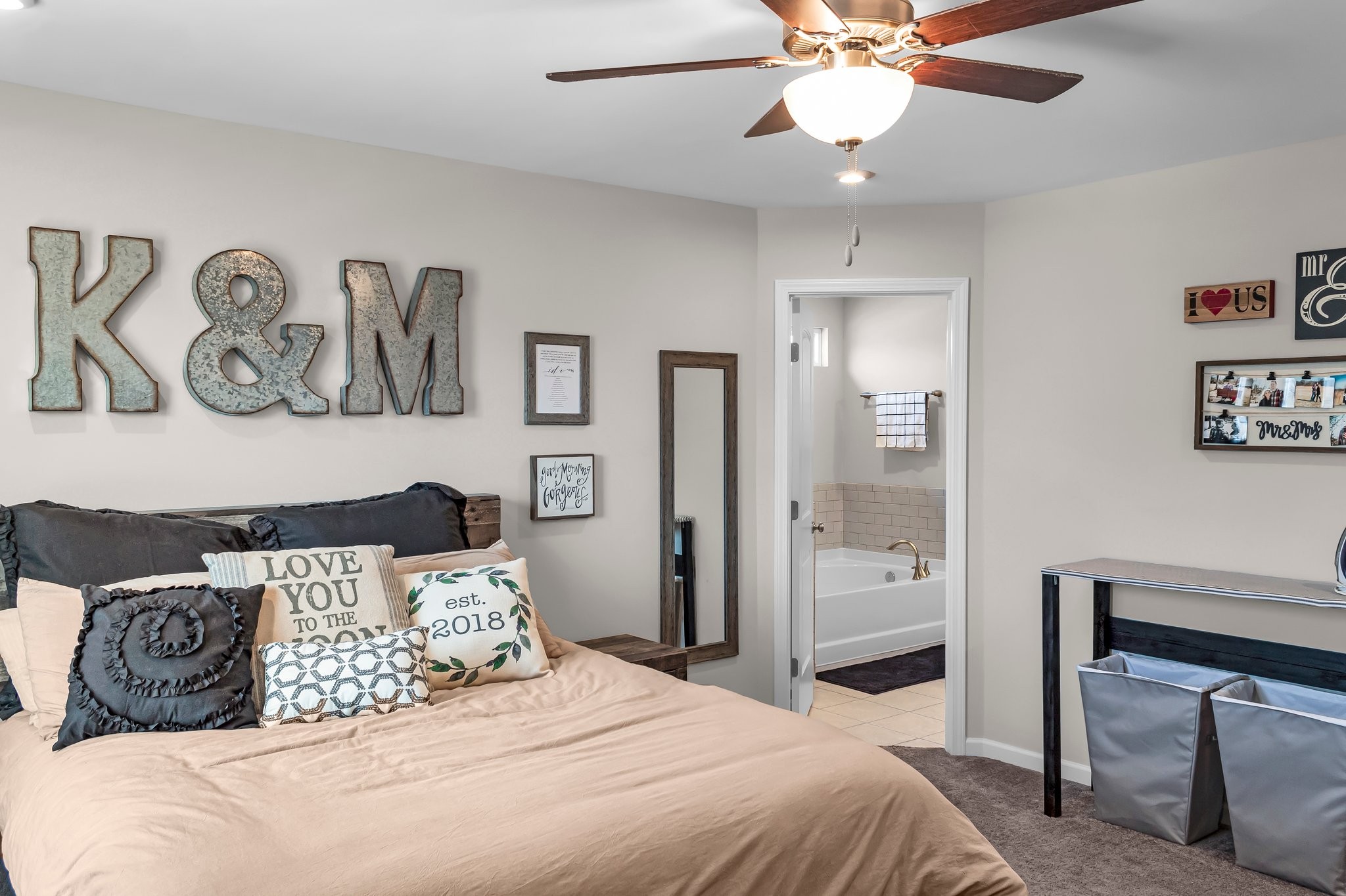 314 Disley Way Murfreesboro, TN 37128 - Photo 12 of 25 a bedroom with a bed and a chandelier