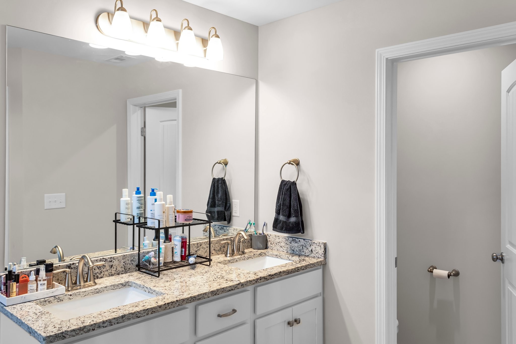 314 Disley Way Murfreesboro, TN 37128 - Photo 13 of 25 a bathroom with double vanity sinks and a mirror