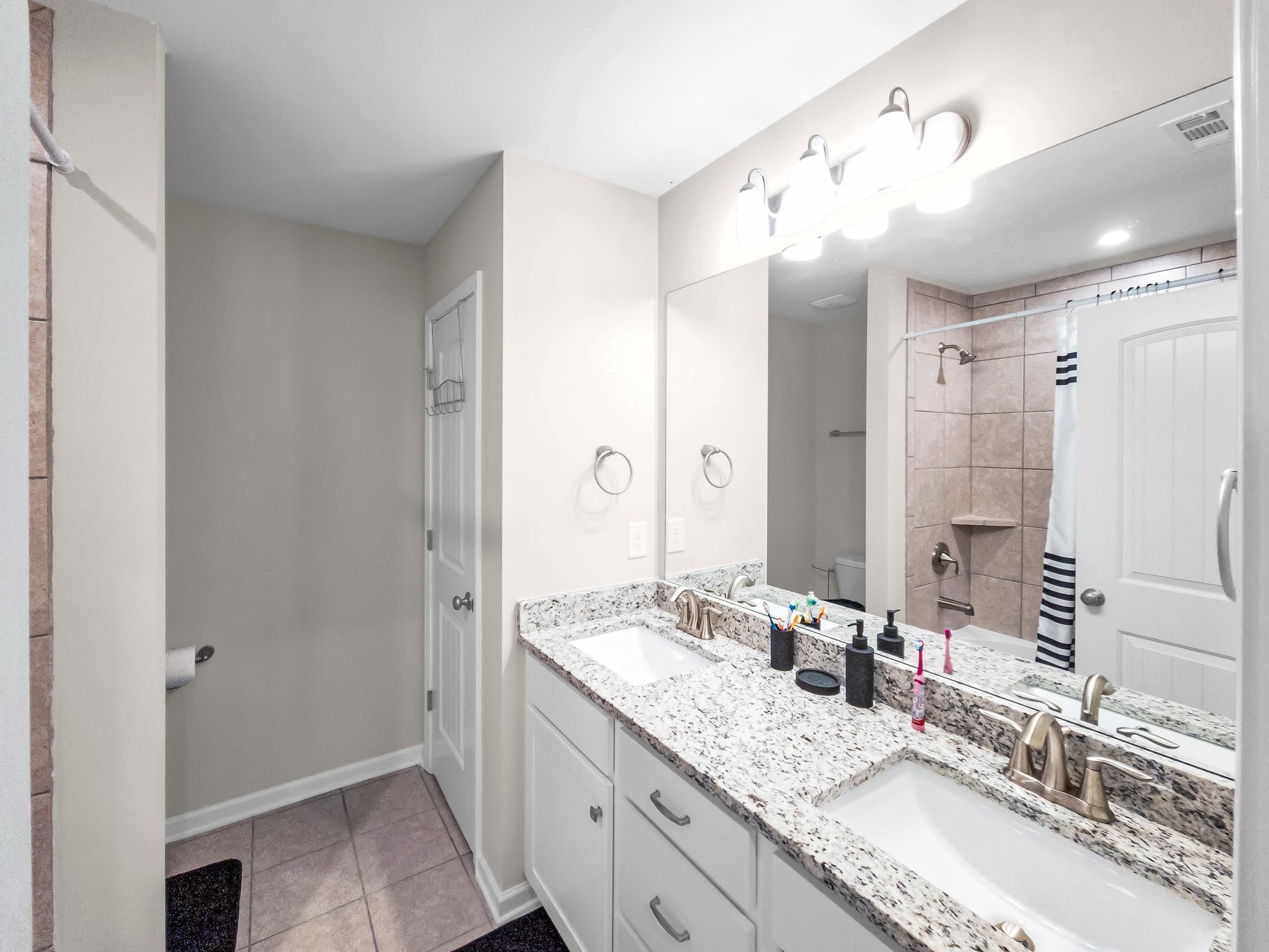314 Disley Way Murfreesboro, TN 37128 - Photo 15 of 25 a bathroom with a granite countertop double vanity sink mirror and double