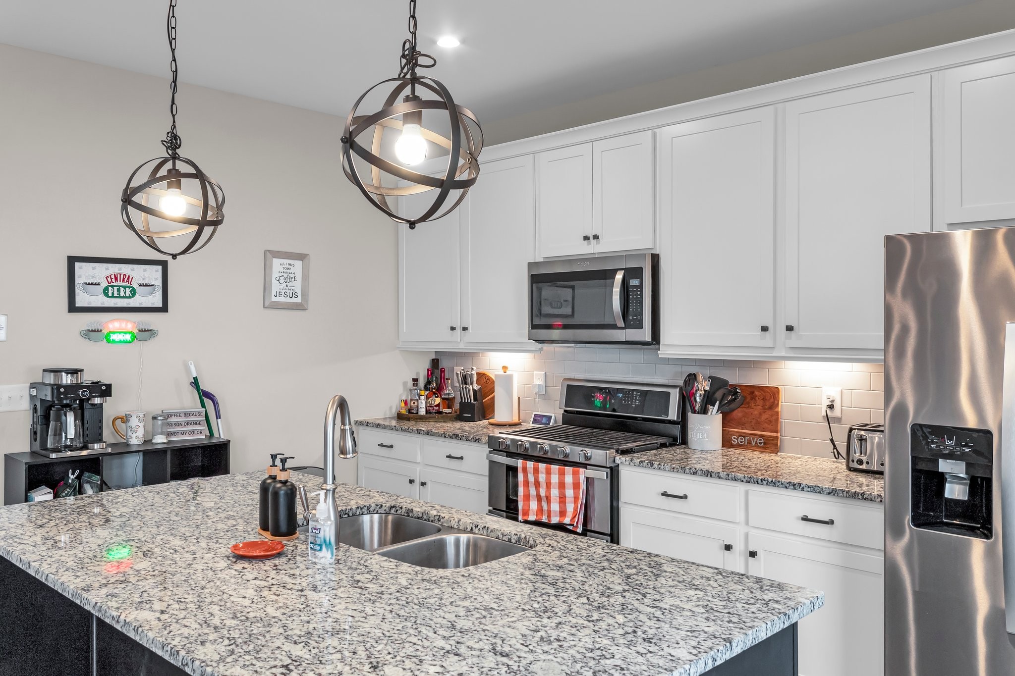 314 Disley Way Murfreesboro, TN 37128 - Photo 8 of 25 a kitchen with stainless steel appliances granite countertop a sink dishwasher stove top oven and cabinets