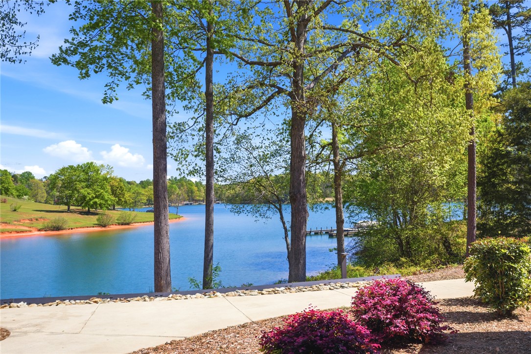 578 Sunset Point Drive West Union, SC 29696 - Photo 39 of 46 This tranquil waterfront setting offers breathtaking views and a serene connection to nature's beauty.