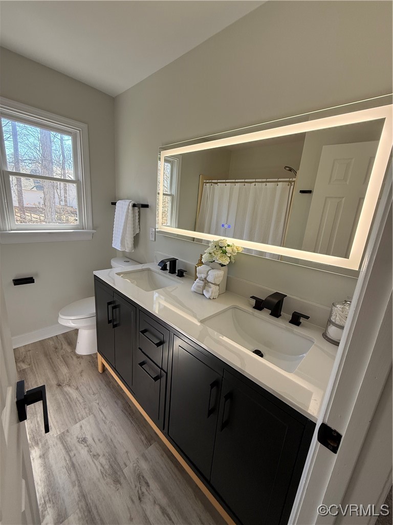 13911 Turtle Hill Road Midlothian, VA 23112 - Photo 18 of 26 a bathroom with a sink and a window